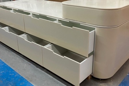 This mid floor unit made of High Macs, a solid surface material, which creates a seamless, sleek finish is completed and ready to go to a high-end retailer in Knightsbridge