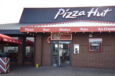 Pizza Hut, Stevenage - exterior of building with Pizza Hut branding and red and white accents