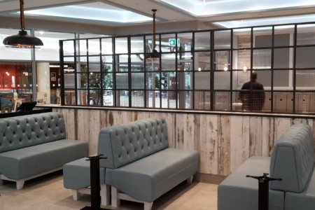 Prezzo, Bournemouth - distressed white wooden panelling, blue booth seating, dividers