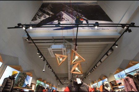 The North Face, Chelmsford - ceiling with large mountain climbing graphic and geometric light fittings