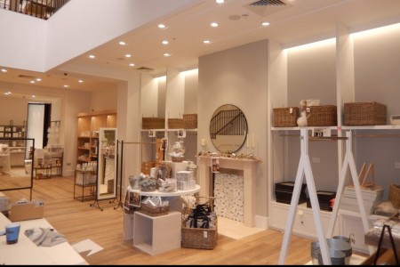The White Company, Liverpool - white walls, wooden floor, white accessories 