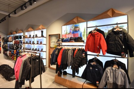 The North Face, Chelmsford - interior fittings with geometric wooden shapes around shelving and clothing displays