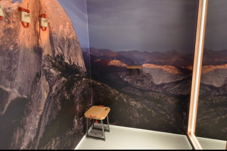 The North Face, Chelmsford - fitting rooms with wraparound mountain graphics and stool in corner