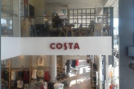 Next, Havant - Costa branding on a mid-level between upper and lower floor