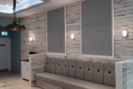Prezzo, Bournemouth - blue bench seating, distressed white wooden panelling 