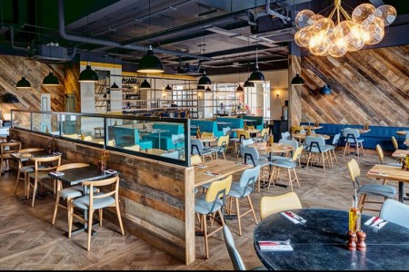 Wildwood, Braintree - seating area, with wooden parquet style floor, wooden walls, wooden dividers, industrial style lighting and ceiling