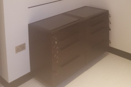 Bespoke shopfitting by Oakwoods for Auerbach & Steele includes this black cabinet