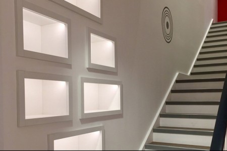 Le Creuset, St Albans - lightboxes in wall on stairs
