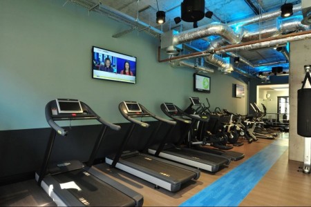 Commercial Fittings UK - Spitalfields London, treadmills, tv, wooden flooring