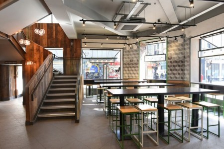 Shake Shack, Leicester Square - staircase leading up, stool seating and tables