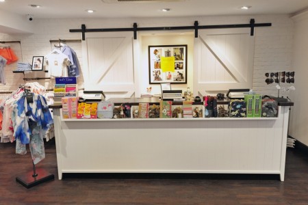 Joules, Cheltenham - till area with display and doors