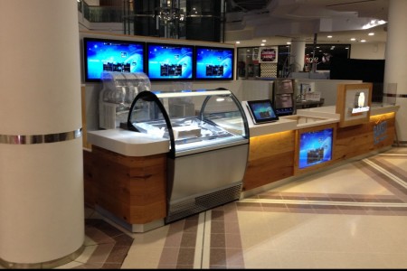 Oakwoods designed and installed this bespoke wooden counter for Auntie Anne's