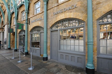 Shake Shack, Covent Garden - exterior of shop with grey panelling 