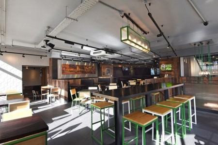Shake Shack, Leicester Square - stools and high tables, white tiled walls and wooden cladding