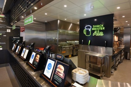 Shake Shack, Leicester Square - close up of till area with kitchen behind