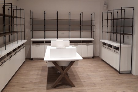 The White Company, Windsor - interior shop fittings with display shelving and wooden floor