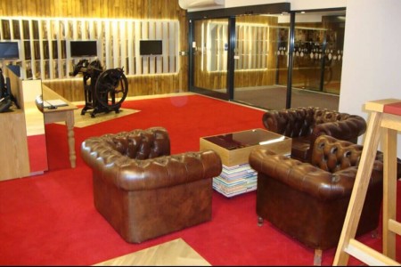 Howdens National Distribution Centre - leather seating area and wooden panelling