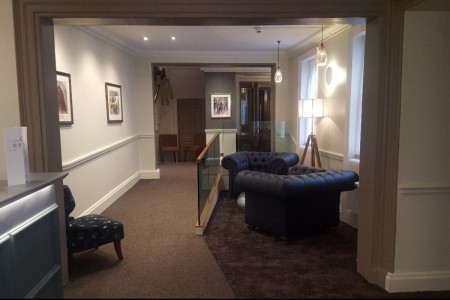 The Chequers Hotel, Newbury - leather chairs, white walls, waiting area