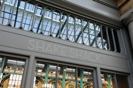 Shake Shack, Covent Garden - grey shopfront with lighter grey branding