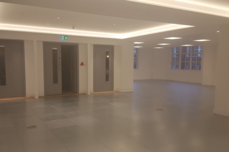 Meyer Bergman, Mayfair - large open office with white walls and grey flooring