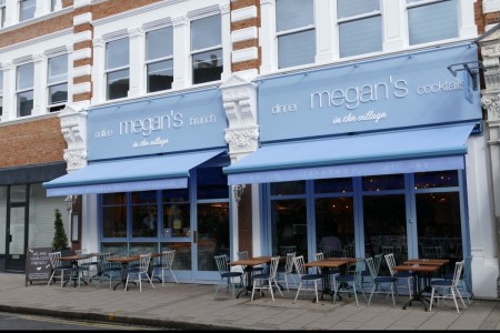 Street view of Megan's with outside dining