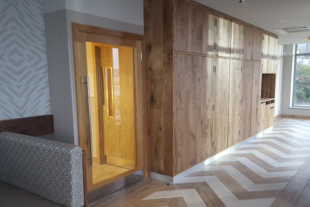 Prezzo, Mumbles - chevron style wooden flooring, wooden and glass door