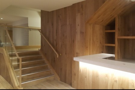 Prezzo, Mumbles - wooden cladding around wooden staircase