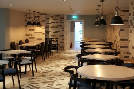 Prezzo, Chippenham - blue chairs and white tables, distressed tiling, tiled flooring