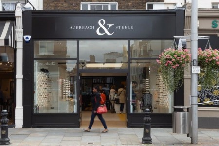 Striking black shopfront of Auerbach & Steele fitted out by Oakwoods